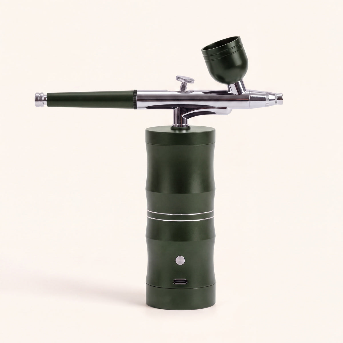 Draadloze airbrush in donkergroen