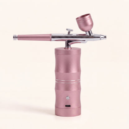 Draadloze airbrush in roze